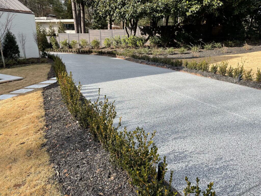 Straight gray flake epoxy driveway