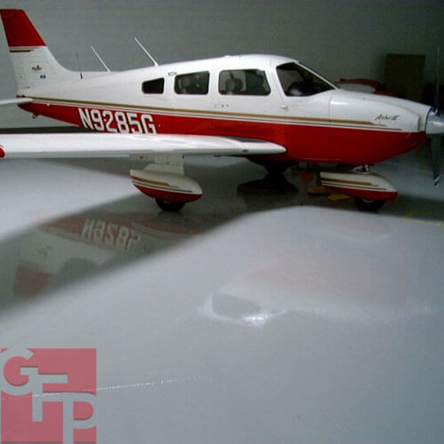 Airplane Hangar Epoxy Flooring with Airplane