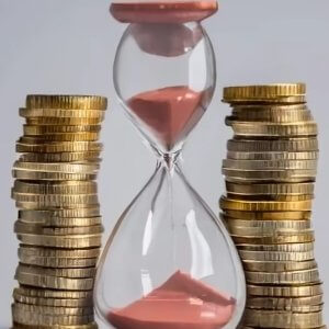 Hour glass in between two stacks of gold coins